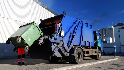 Photograph of a house clearance team beginning work on a property