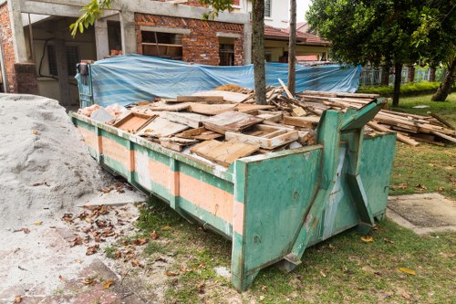 Professionals performing loft clearance in a Holborn home