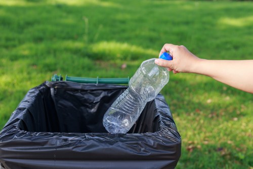 Employees participating in workplace recycling program